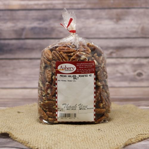 A clear plastic bag of Pecan Halves Roasted No Salt, closed with a twist tie and set on rustic burlap with a wooden background.