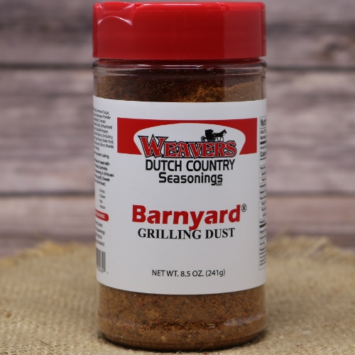 A jar of Weaver's Dutch Country Seasonings Barnyard Grilling Dust with a red lid.