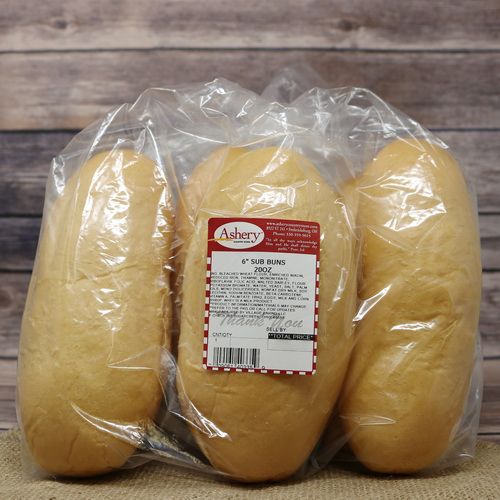 Bag of 6 inch Sub Buns, sealed with a twist tie, with a rustic wooden background on burlap.