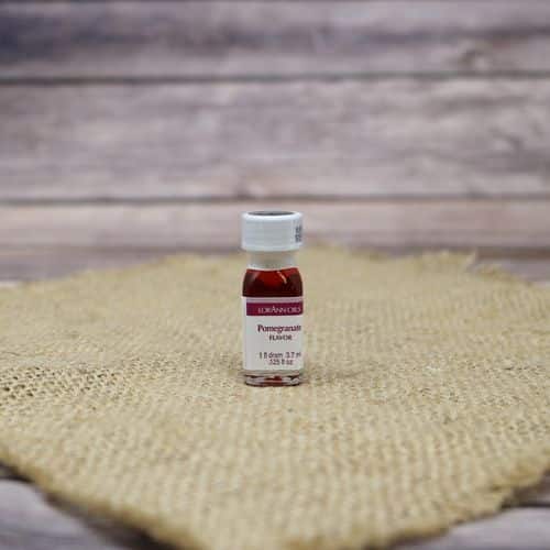 small bottle of pomegranate-flavored oil