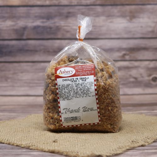A bag of Chocolate Peanut Butter Granola on rustic burlap with a wooden background.