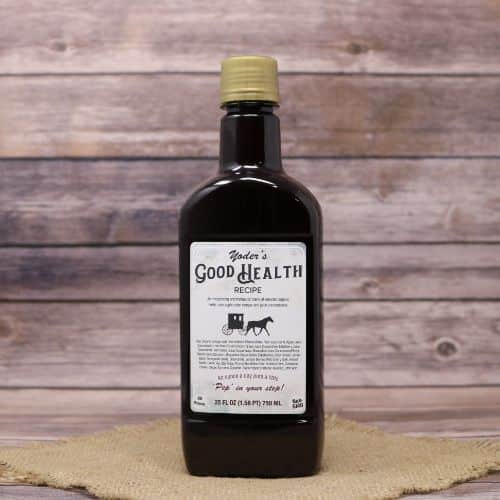 A 25 oz bottle of Yoder's Good Health Recipe, set on rustic burlap with a wooden background.